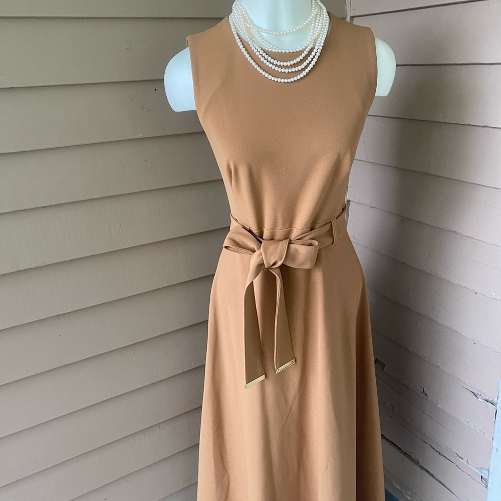 Calvin Klein.Elegant Tan Sleeveless Dress Size: 2 / 44” long